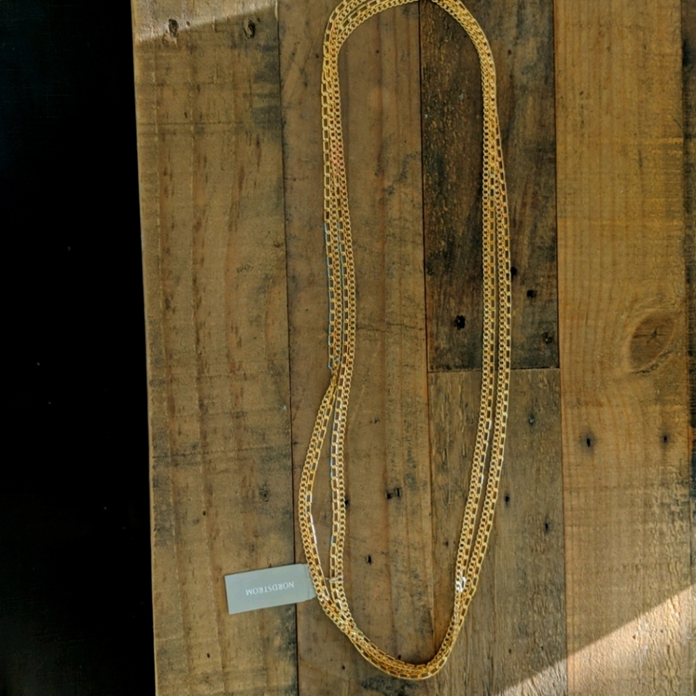 Long gold necklace